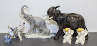A Collection of Six Porcelain Elephant Figures Height of tallest 10 1/2 inches.