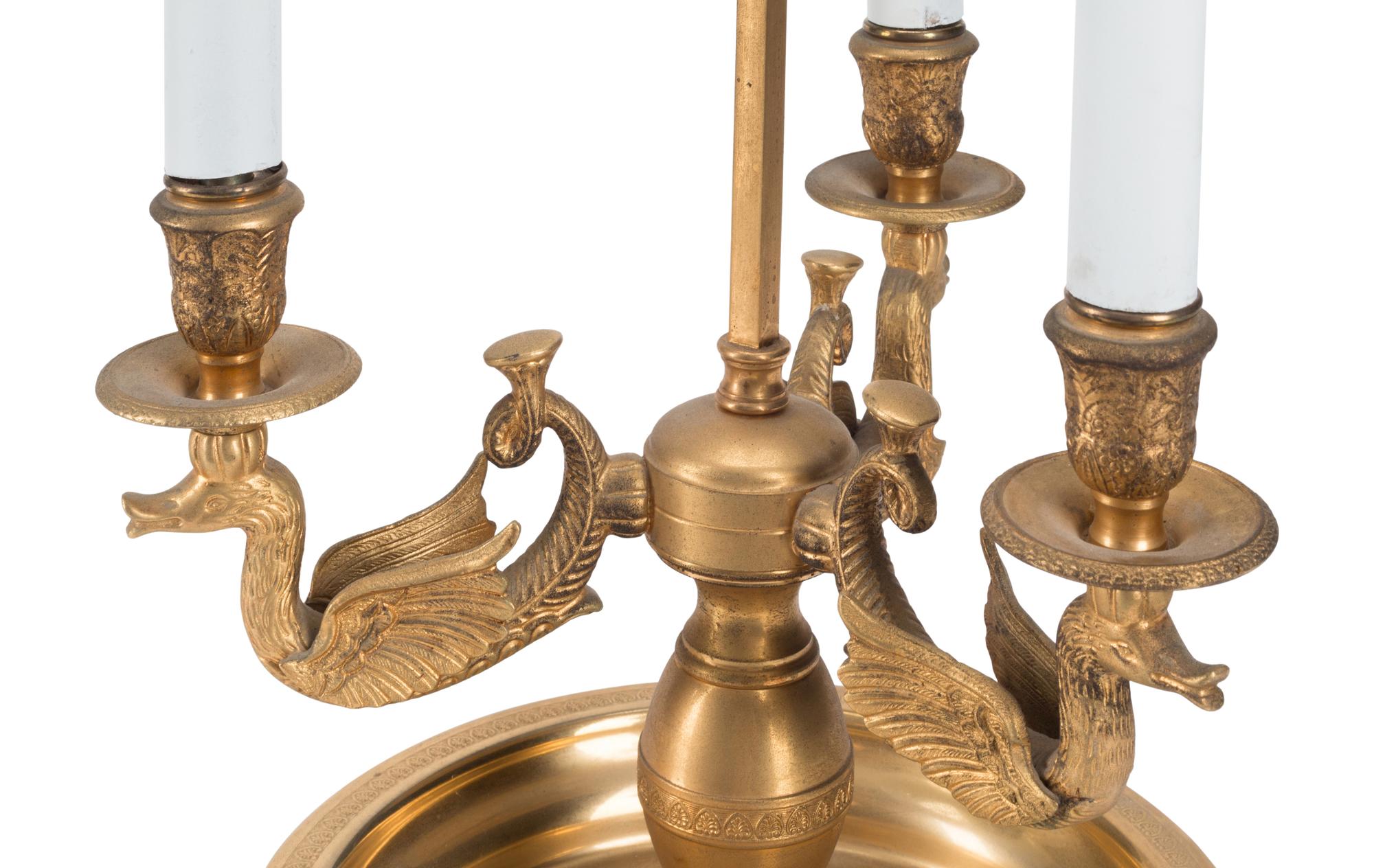 A Pair of French Gilt Metal and Tole Bouillotte Lamps