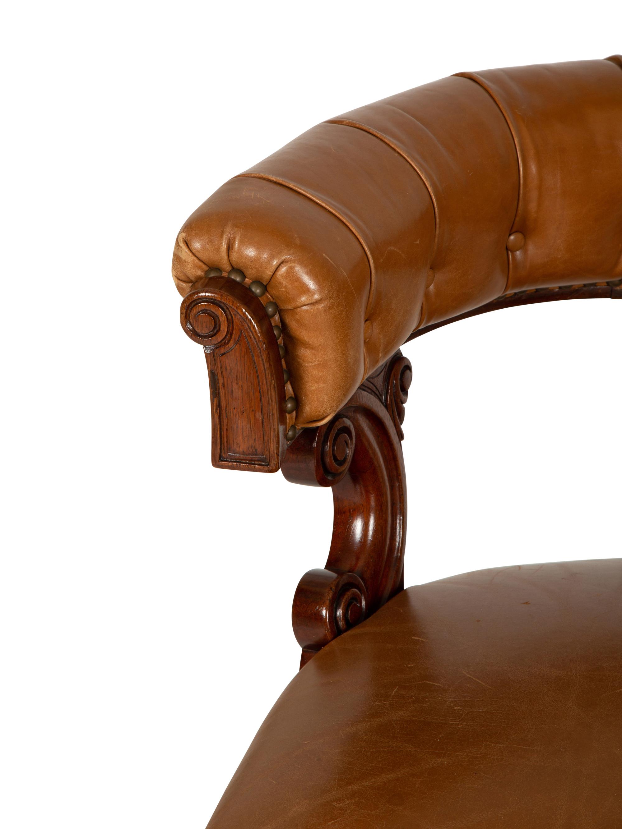 A Pair of William IV Style Leather-Upholstered Mahogany Armchairs