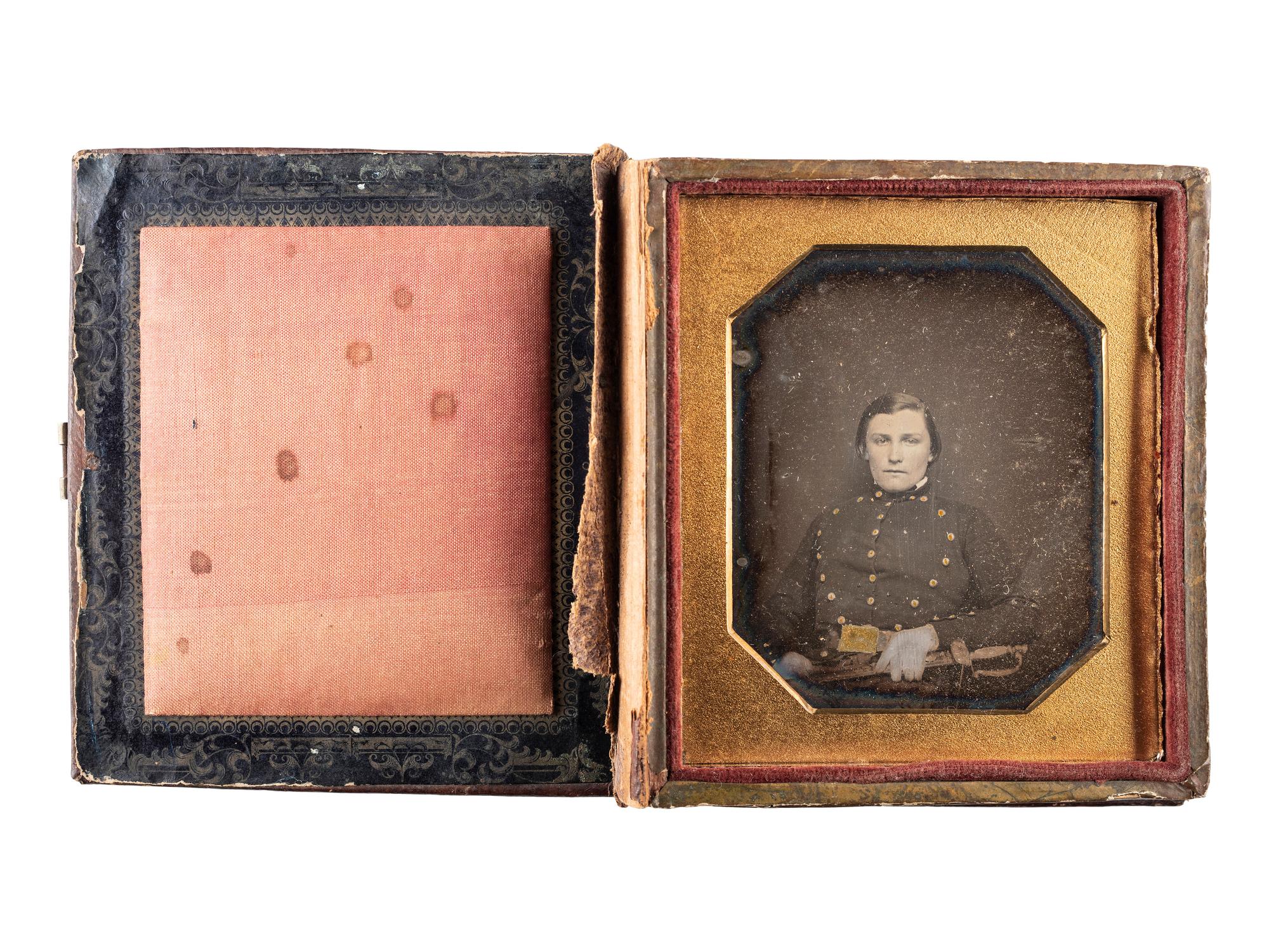 [EARLY PHOTOGRAPHY] -- [MILITARIA]. A group of 3 daguerreotypes of uniformed soldiers.