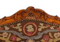 A Pair of Régence Walnut Needlepoint-Upholstered Fauteuils