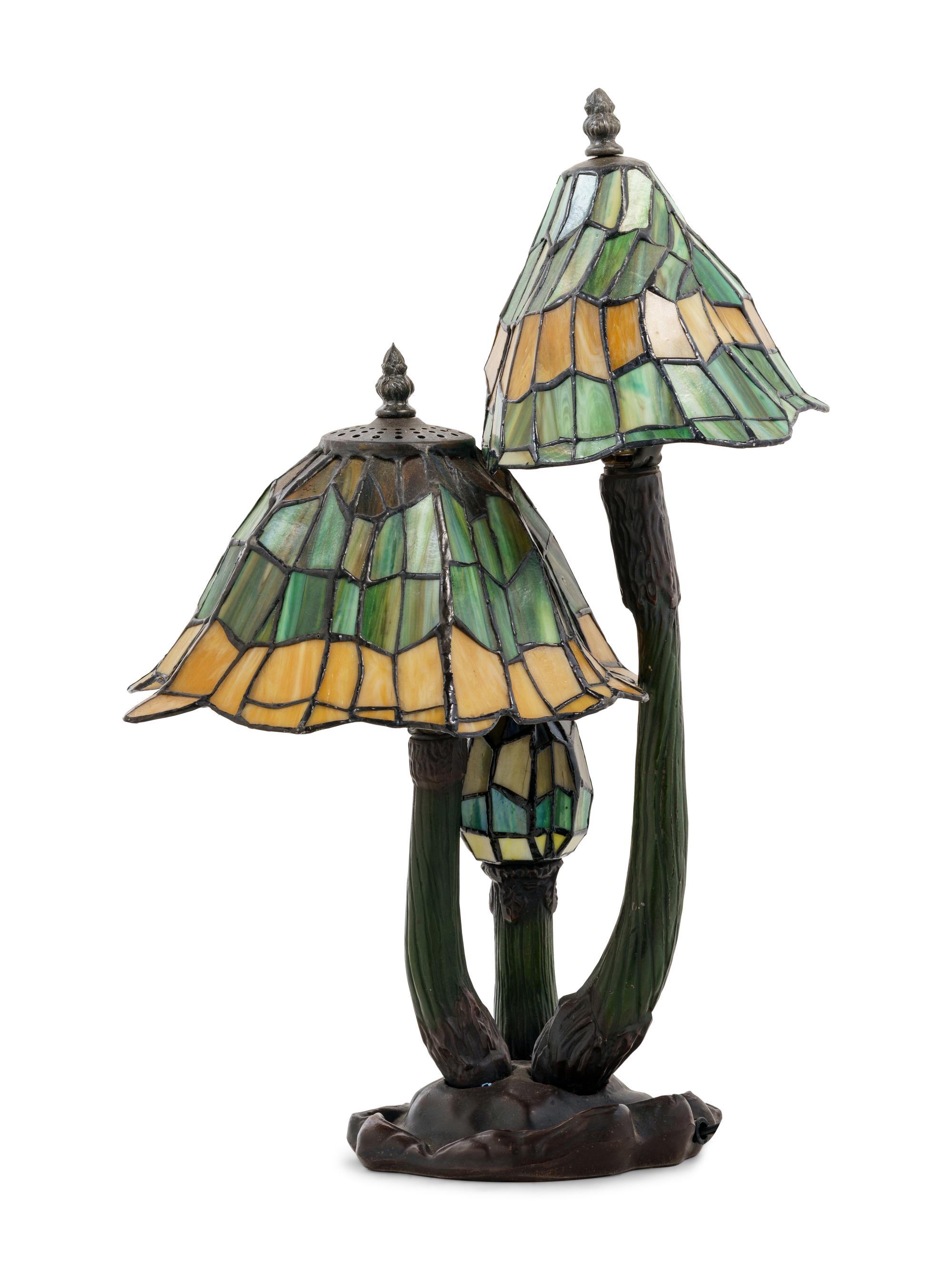 An Art Nouveau Style Cast and Patinated Bronze Leaded Glass Mushroom Desk Lamp