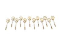 A Set of Twelve Russian Enameled Silver-Gilt Coffee Spoons