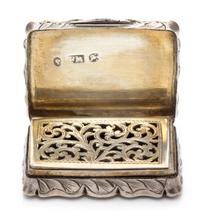 A Victorian Silver Vinaigrette, Frederick Marson, Birmingham, 1857, the case worked with floral decoration, the lid centered by a monog