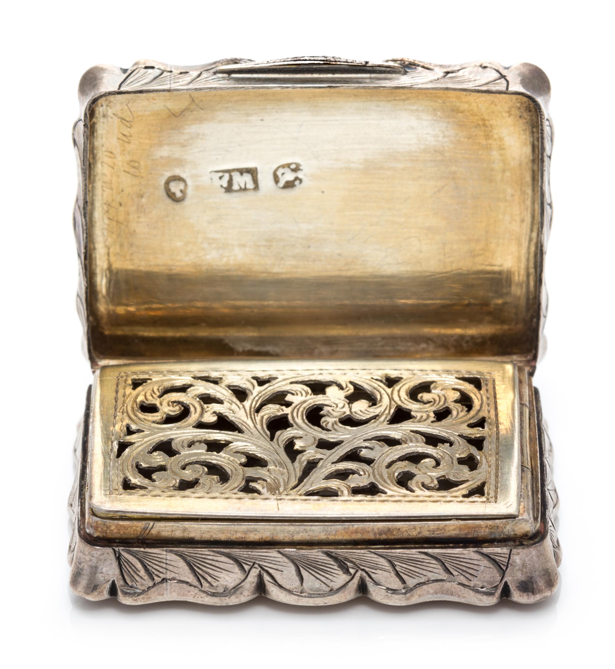 A Victorian Silver Vinaigrette, Frederick Marson, Birmingham, 1857, the case worked with floral decoration, the lid centered by a monog