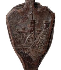 An English Carved Oak Bellows Depicting Warwick Castle