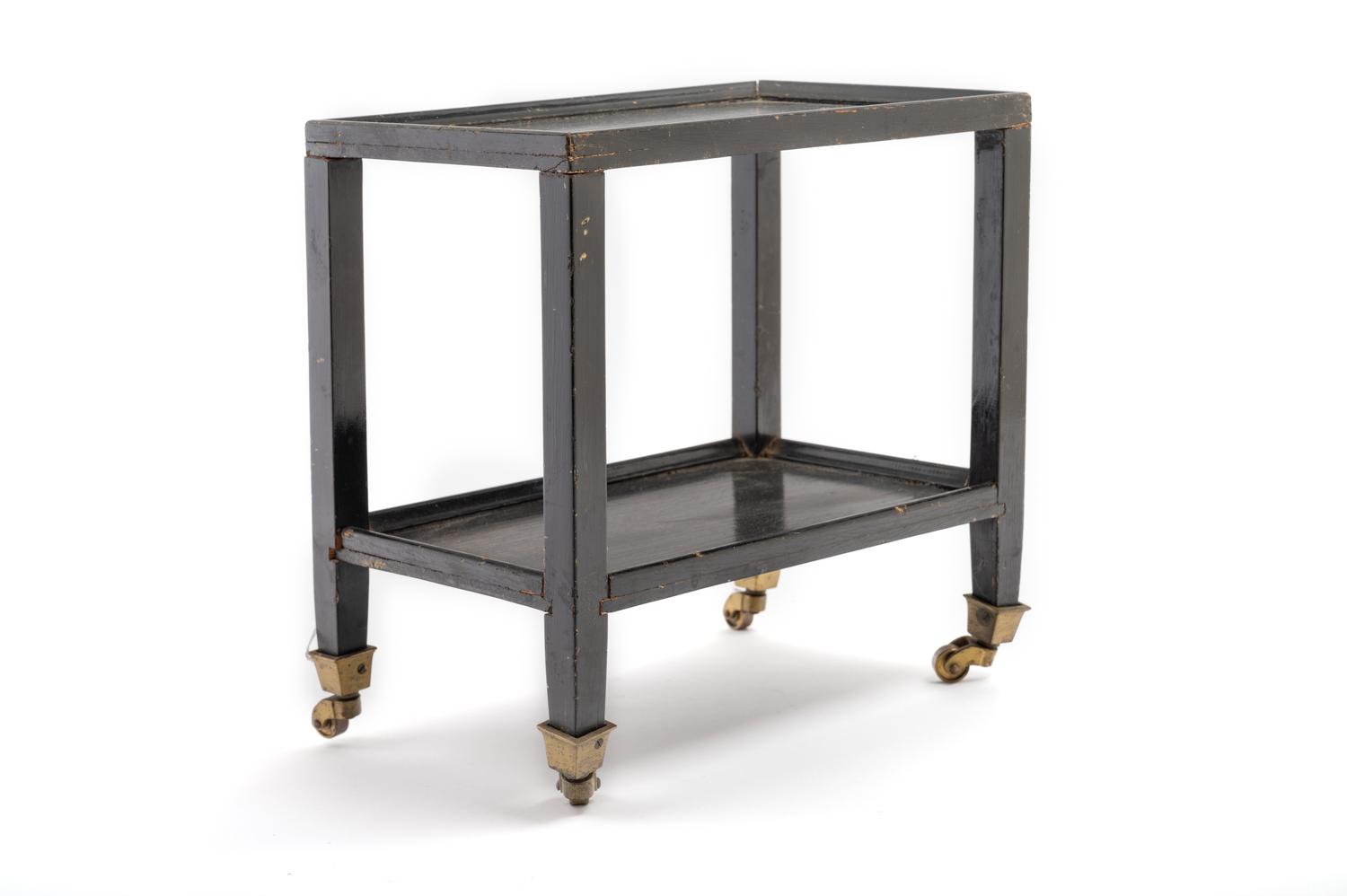 A Black Painted "Telephone Table" in the Style of Karl Springer