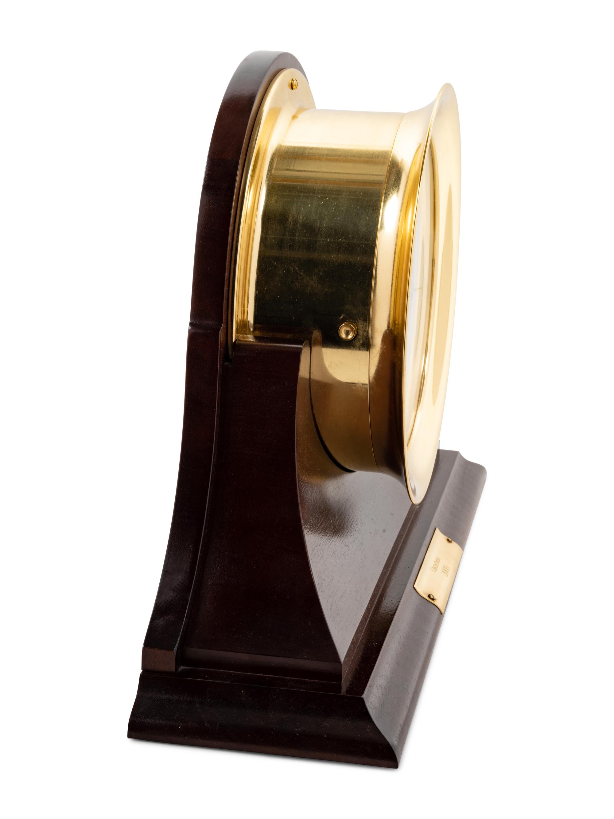 A Chelsea Mahogany and Brass Ship's Bell Clock