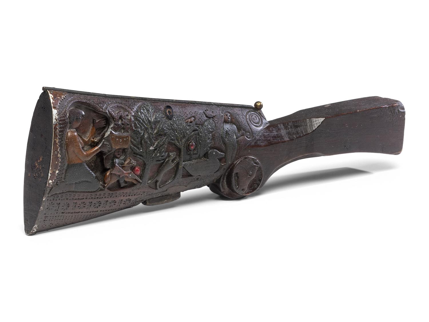 A Folk Art Carved and Punch Decorated Painted Ash Rifle Stock