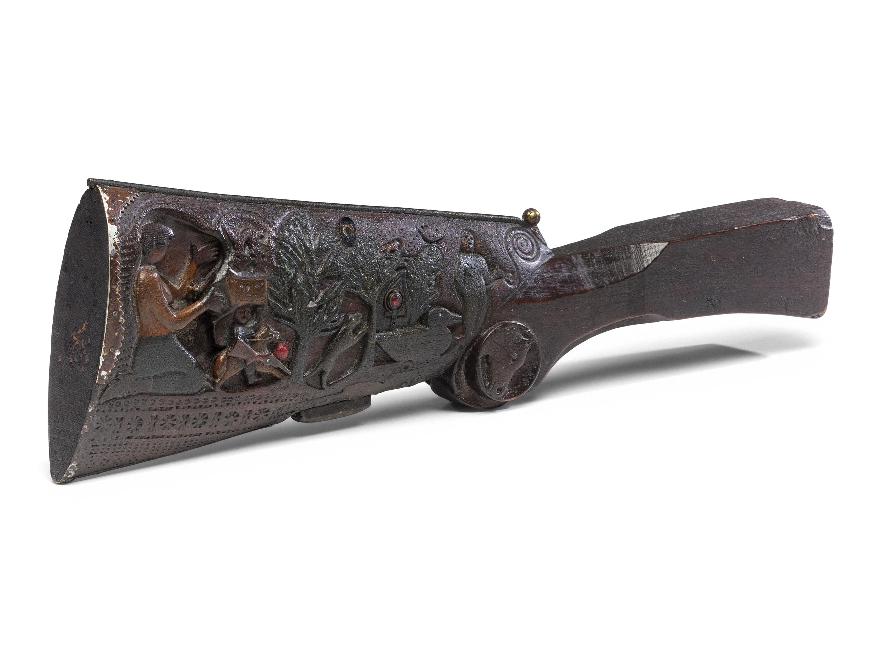 A Folk Art Carved and Punch Decorated Painted Ash Rifle Stock