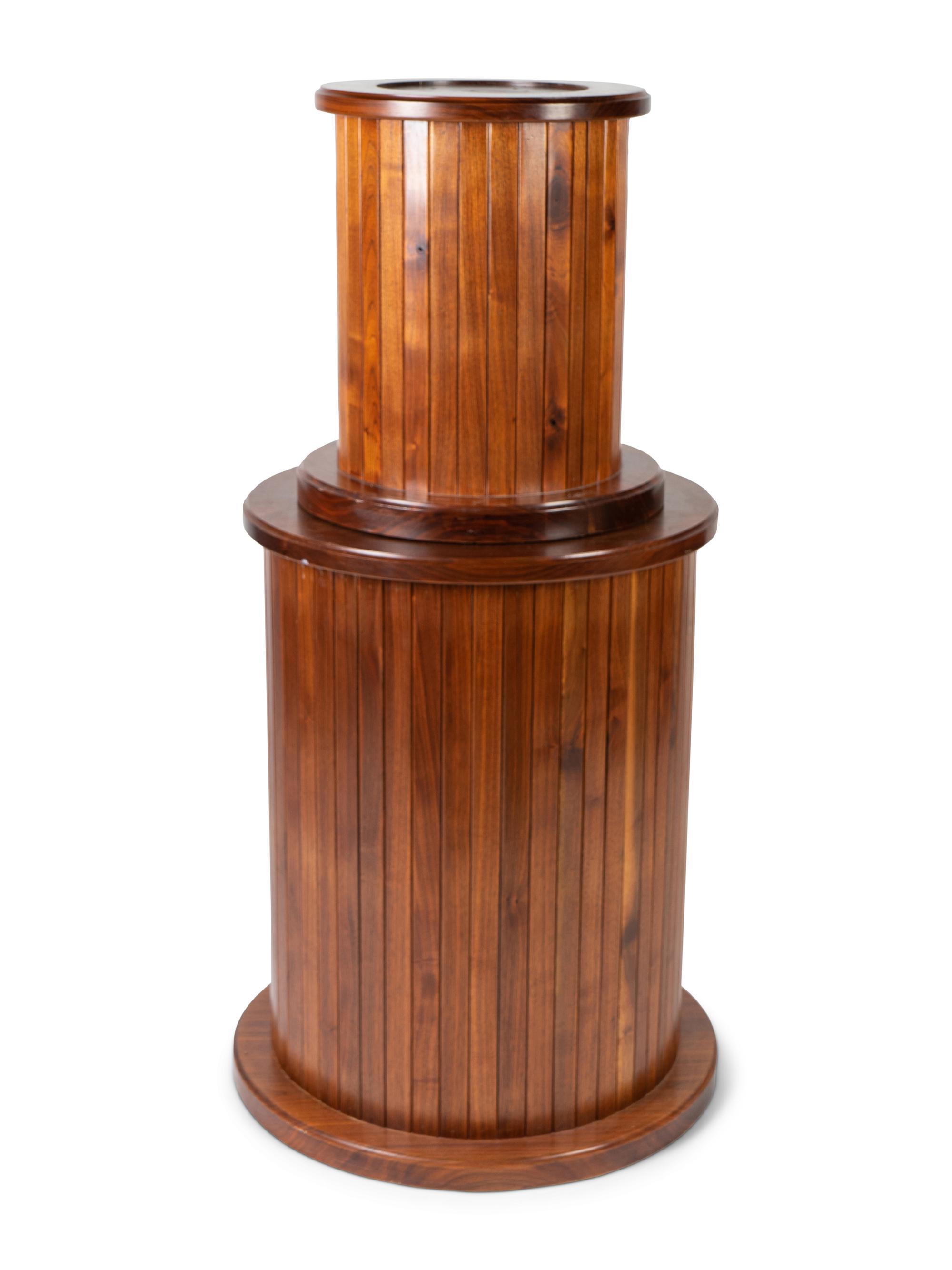 A Neoclassical Style Mahogany Columnar Revolving Pedestal — 20TH CENTURY