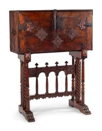 A Spanish Baroque Parcel Gilt Walnut Vargueño on Stand