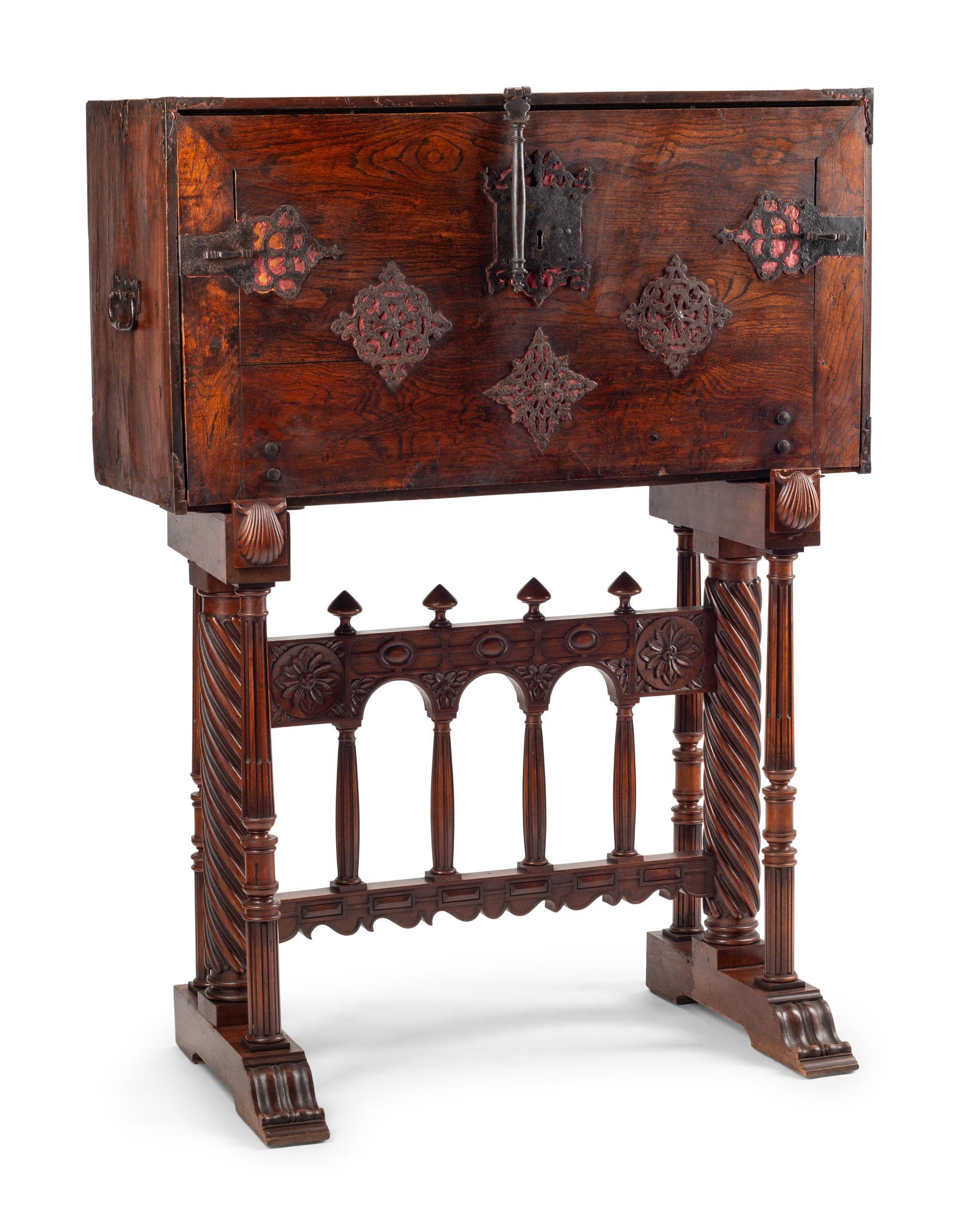A Spanish Baroque Parcel Gilt Walnut Vargueño on Stand