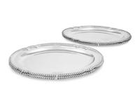 A Set of Four Silver Meat Platters