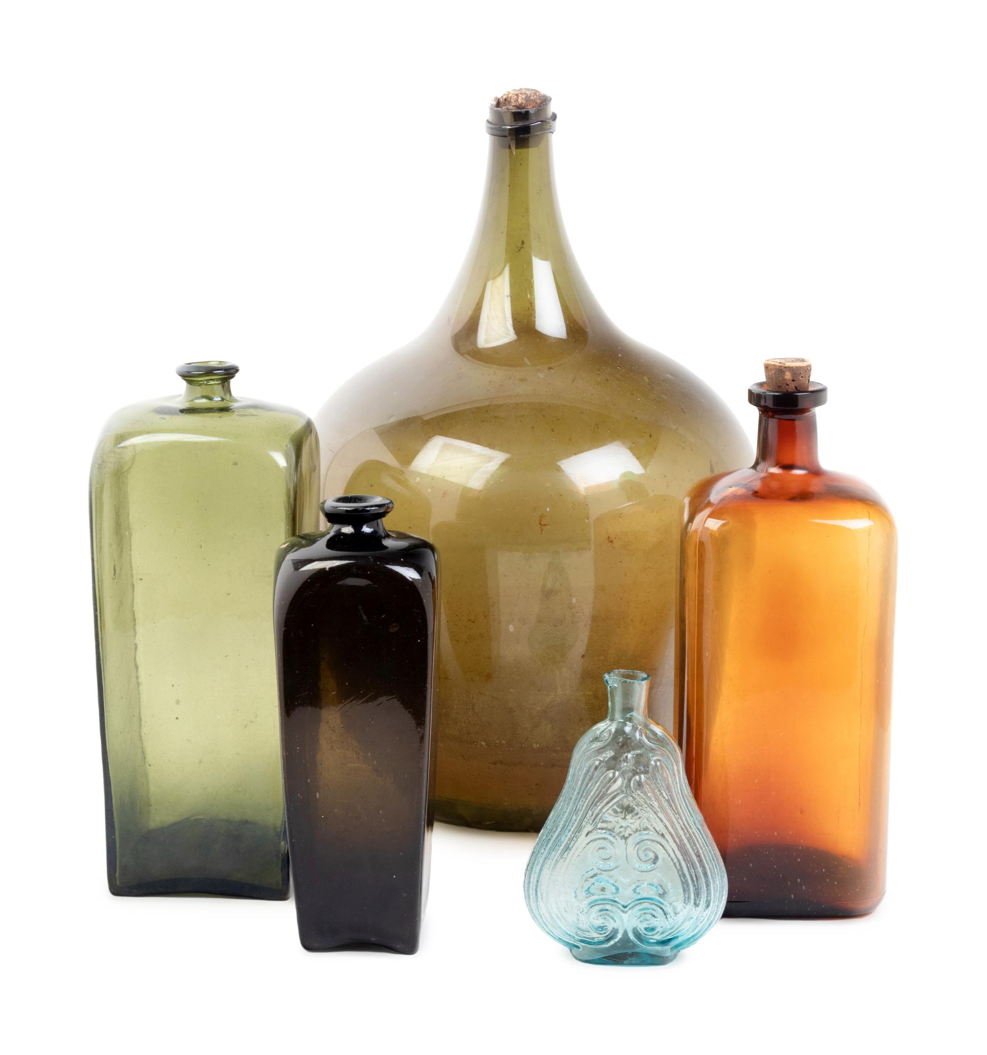 A Group of Colored Glass Bottles