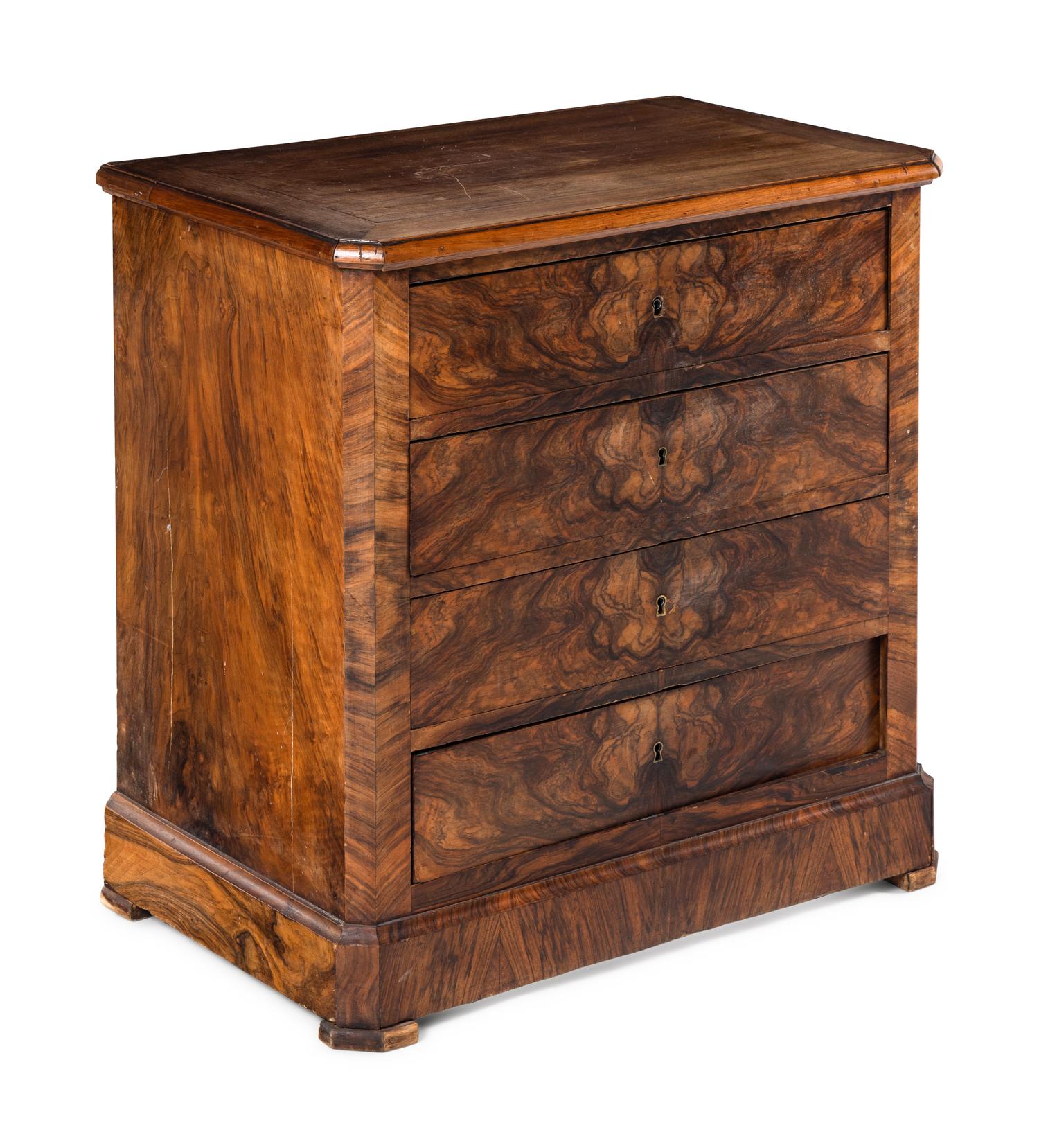 A Continental Figured Walnut Chest of Drawers
