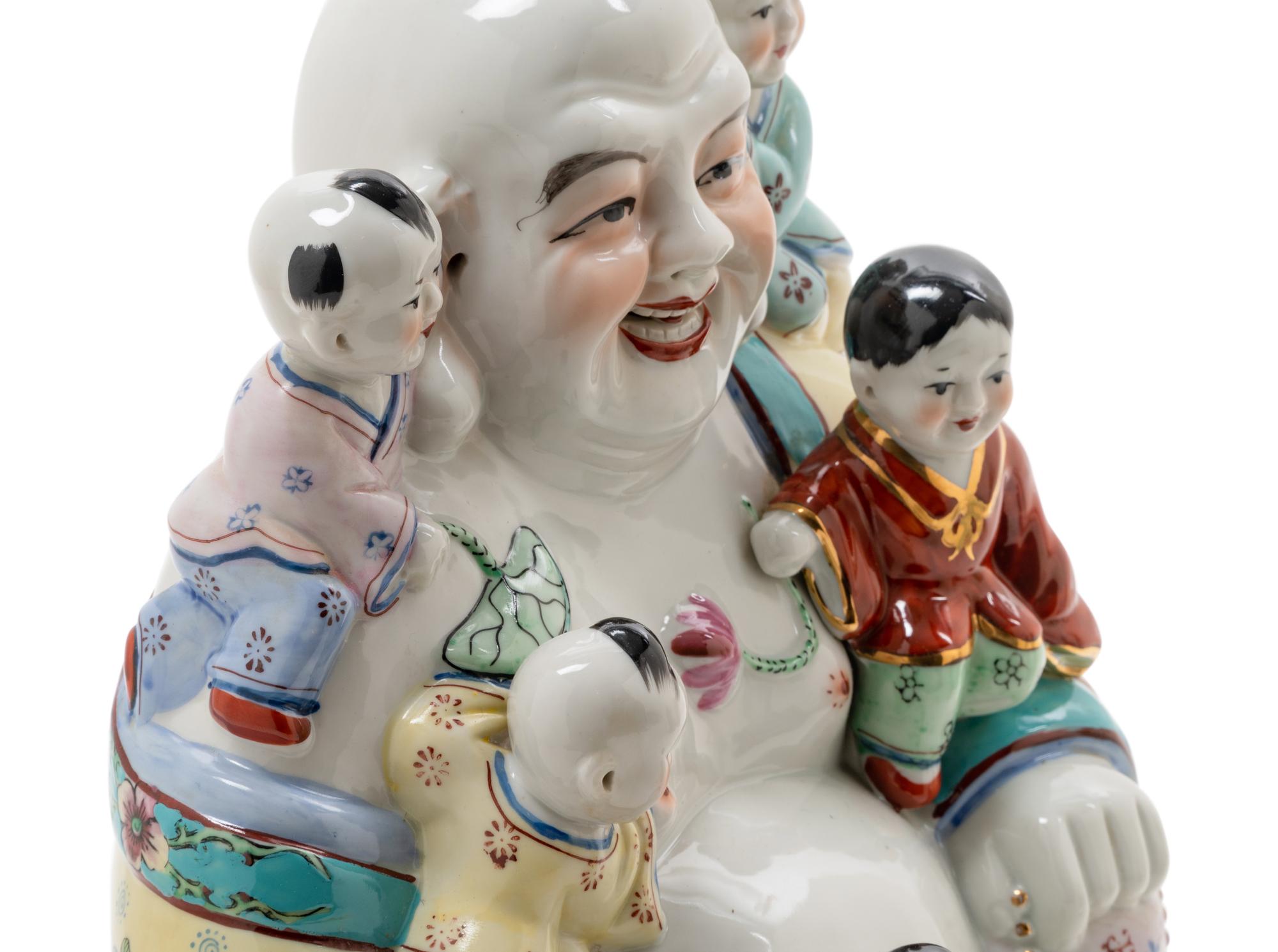 Three Famille Rose Porcelain Figures of Buddhas