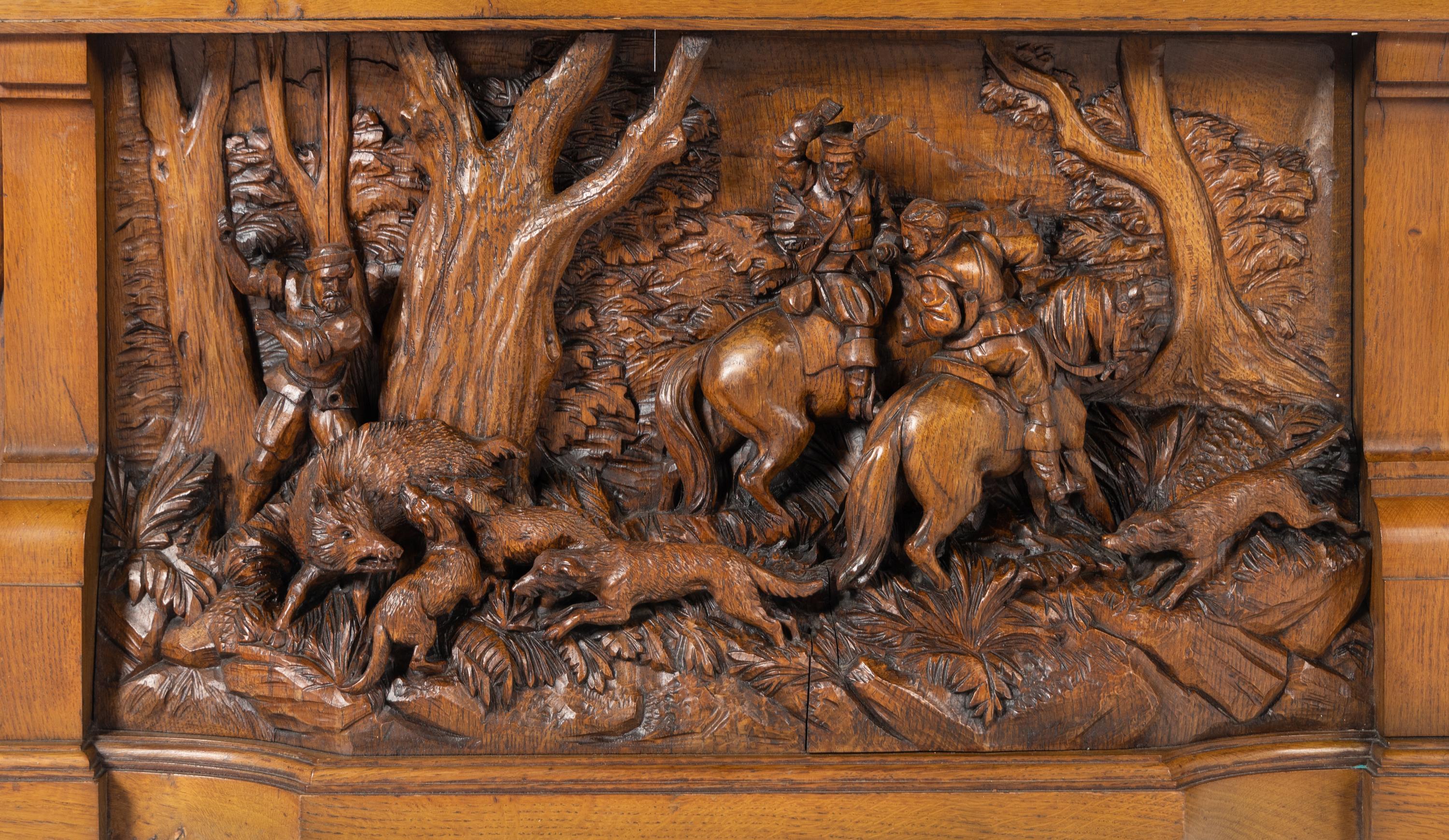 A Black Forest Style Carved Oak Overmantel Panel