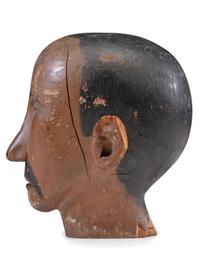 A Folk Art Carved and Painted Pine Carnival Head