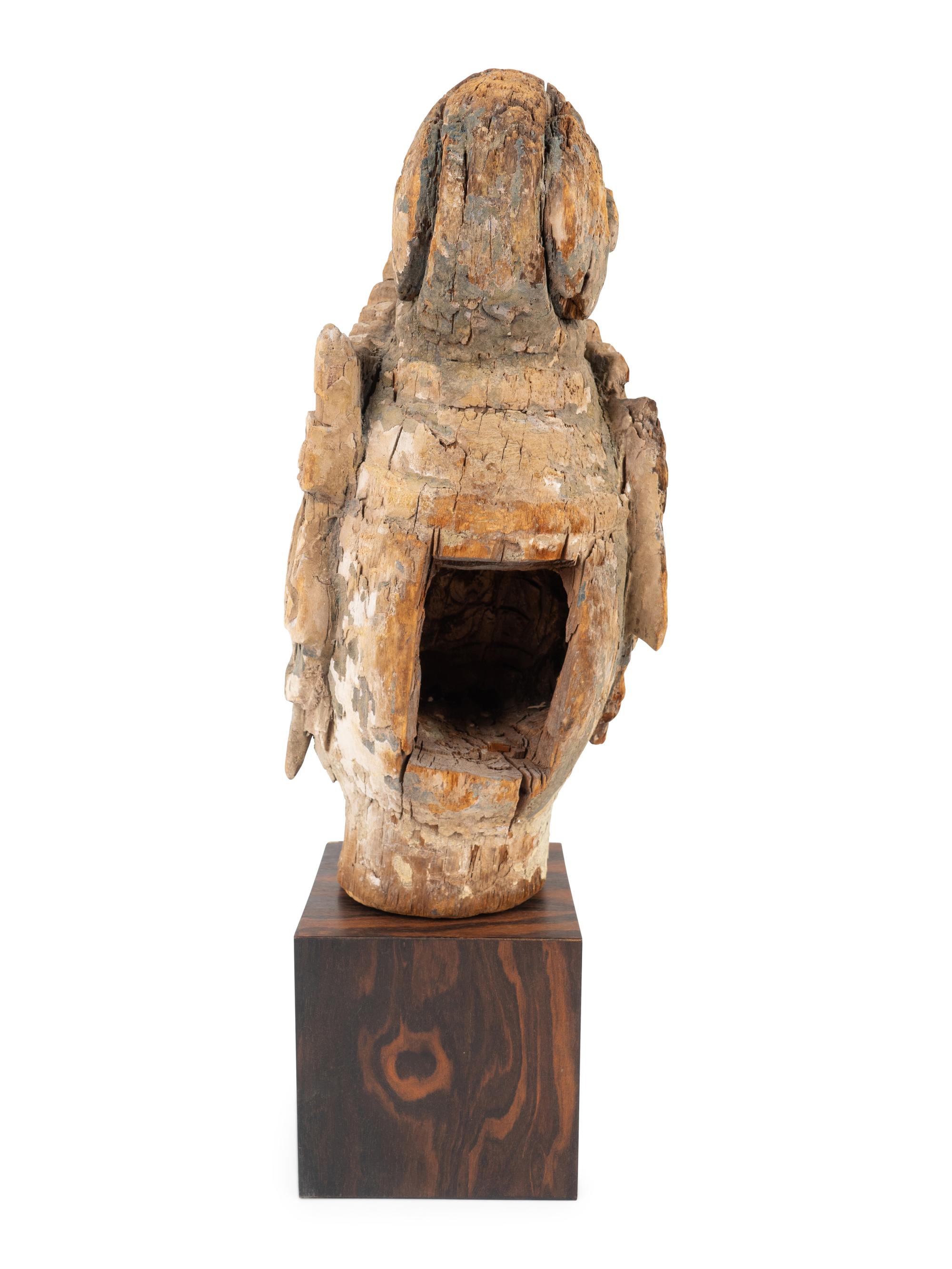 A Chinese Weathered Wood Head of Guanyin — 18TH CENTURY