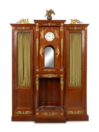 An Empire Style Gilt Bronze Mounted and Clock-Inset Biblioth èque