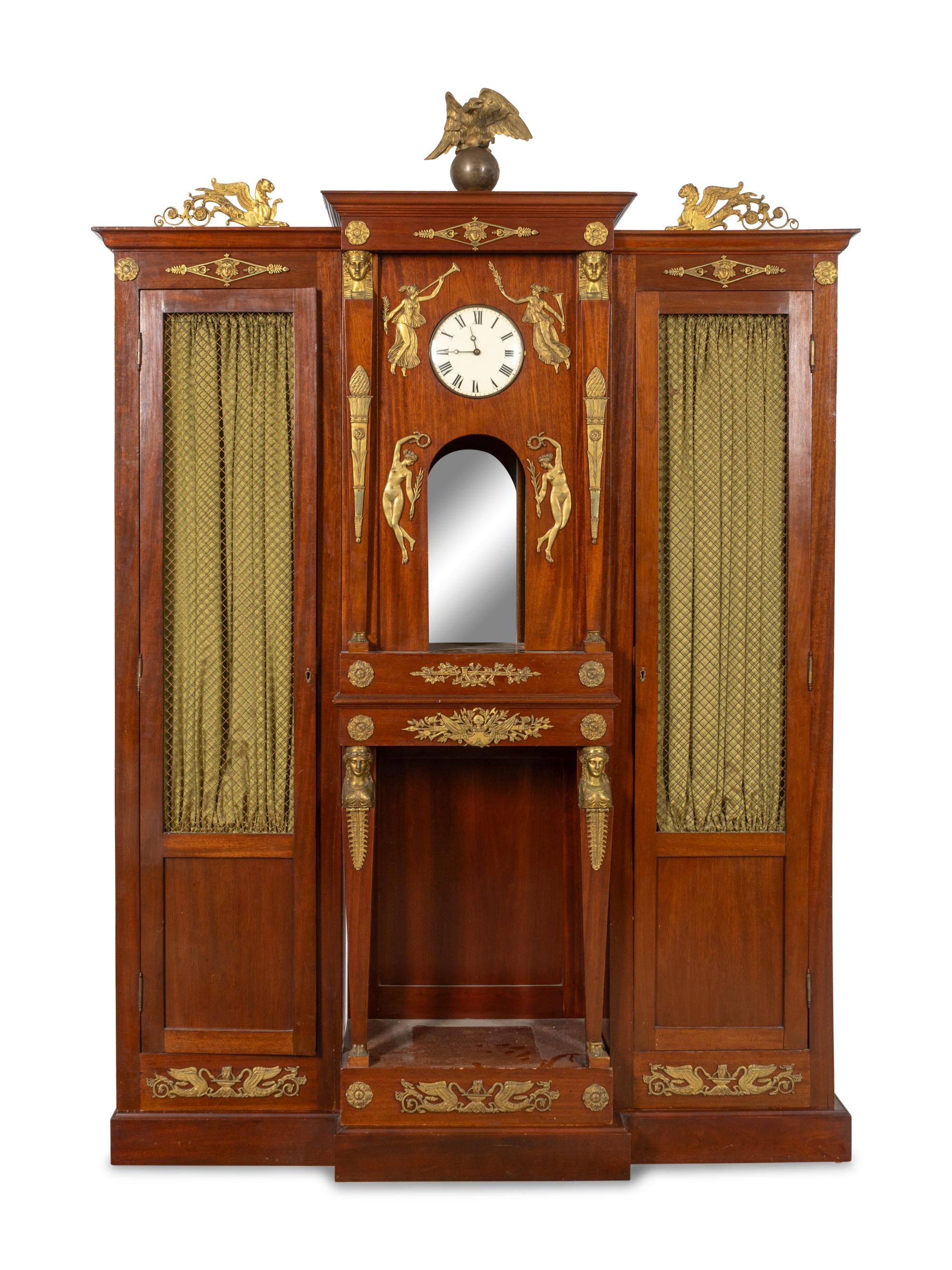 An Empire Style Gilt Bronze Mounted and Clock-Inset Biblioth èque