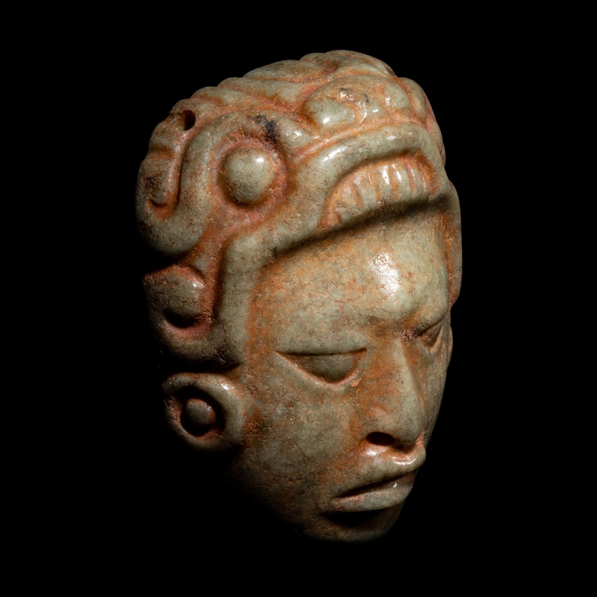 A Maya Jadeite Face Pendant