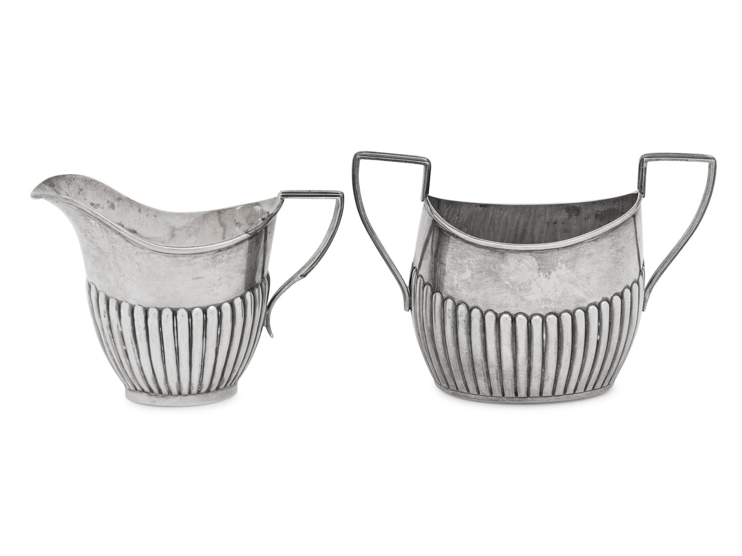 An Assembled Edwardian Silver Three-Piece Bachelor's Tea Service