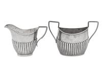 An Assembled Edwardian Silver Three-Piece Bachelor's Tea Service