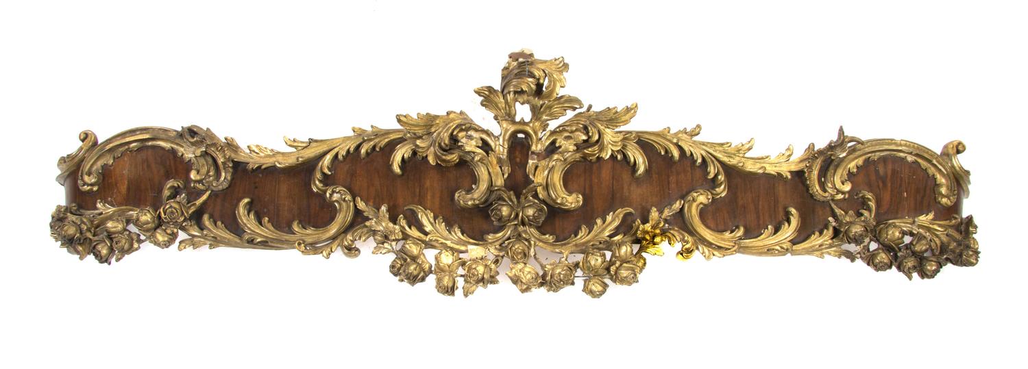 A Pair of Louis XV Style Parcel Gilt Mahogany Valances, Width 62 inches.