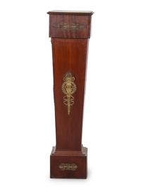 An Empire Style Gilt Metal Mounted Walnut Marble-Top Pedestal