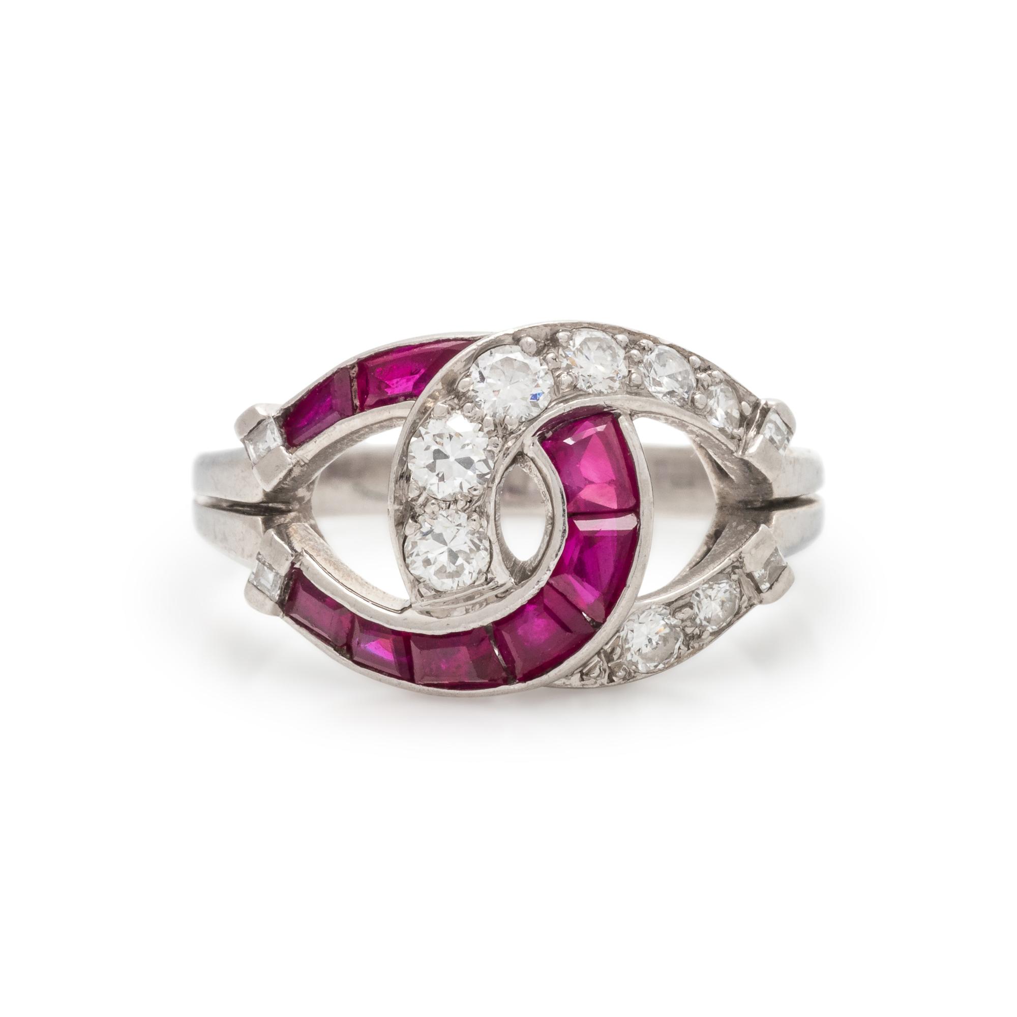 GUMBINER, DIAMOND AND RUBY HORSESHOE RING