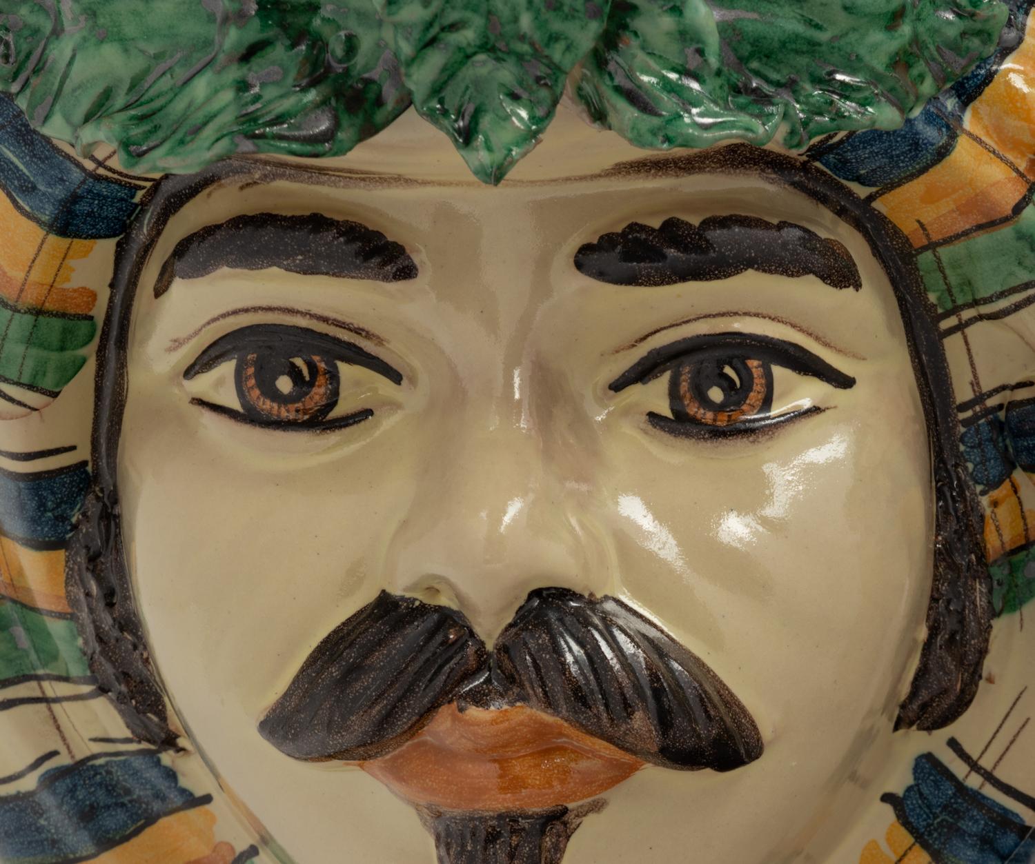 A Pair of Italian Polychrome Glazed Pottery Figural Vases