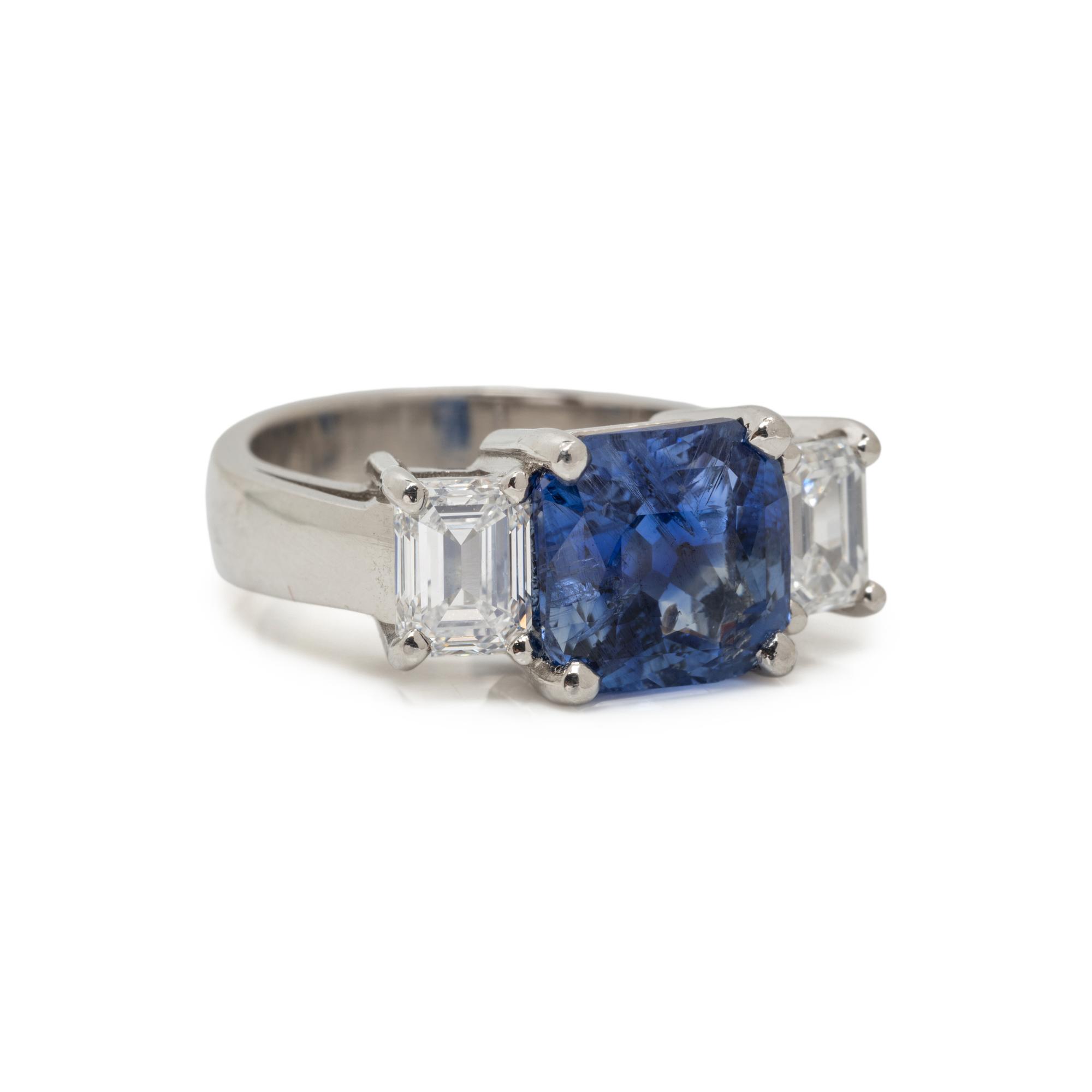 PLATINUM, SAPPHIRE, AND DIAMOND RING