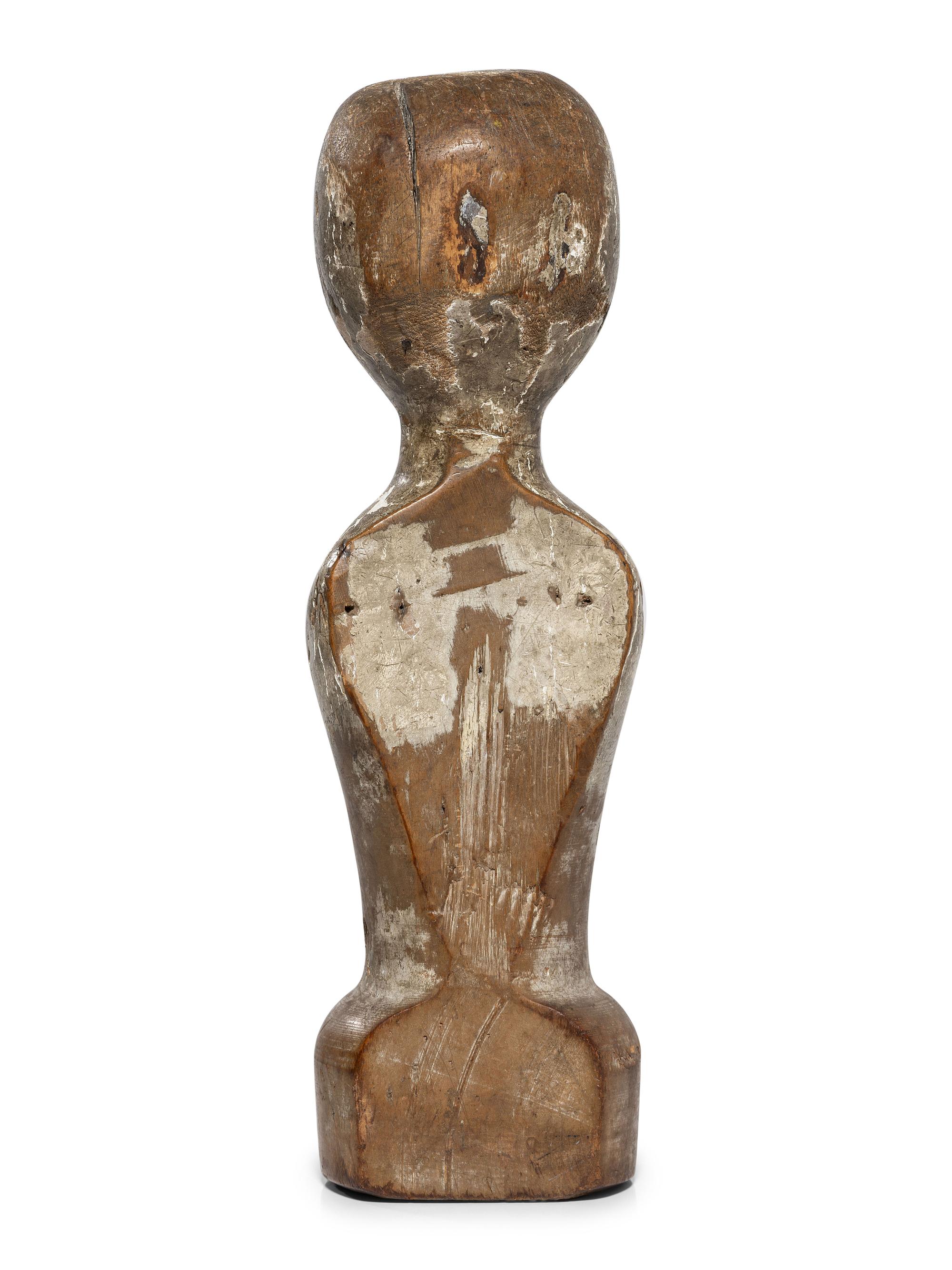 A Folk Art Carved, Painted and Glass Inset Wood Doll "Bed Post" Figure
