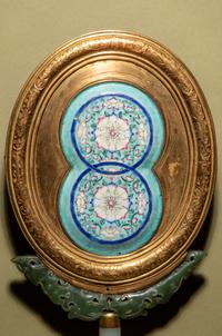 A Painted Enamel and Hardstone Mounted Gilt Metal Hand Mirror
