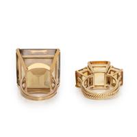 TWO CITRINE AND YELLOW GOLD RINGS