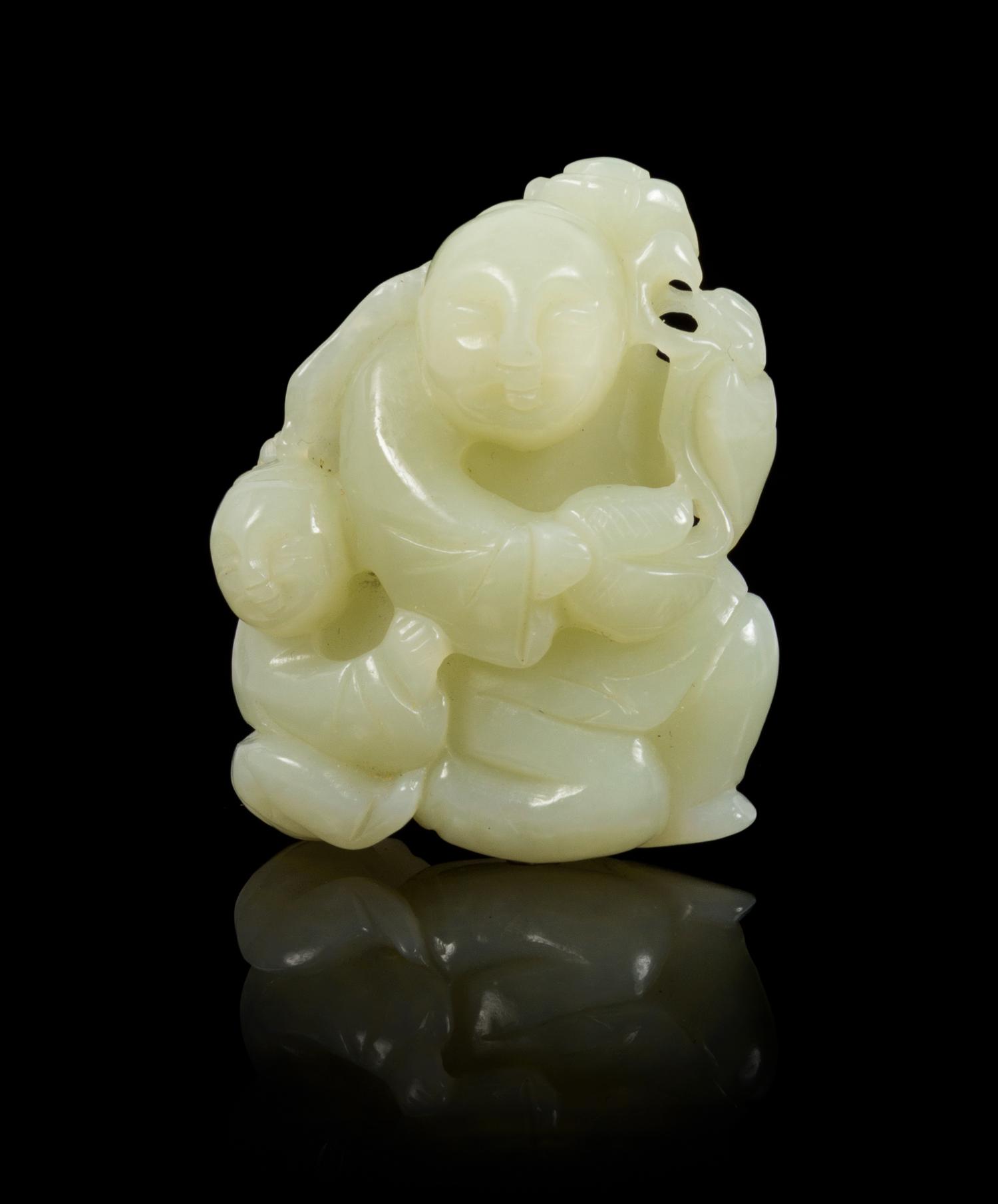 A Celadon Jade Toggle Length 2 1/4 inches.