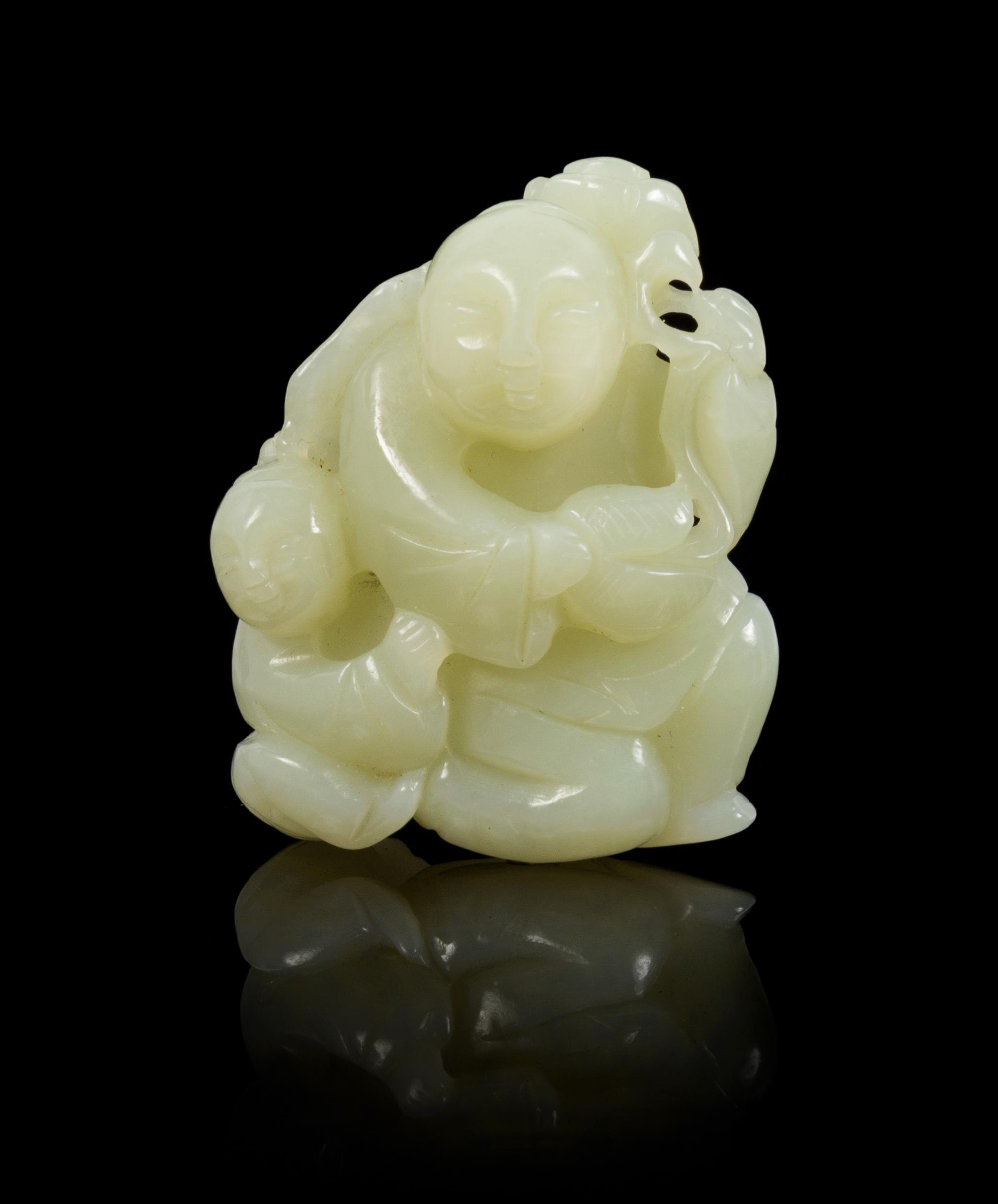A Celadon Jade Toggle Length 2 1/4 inches.