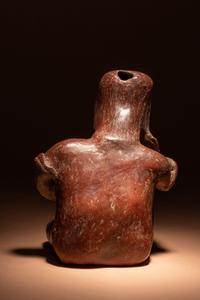 A Colima Terracotta Seated Male Figure