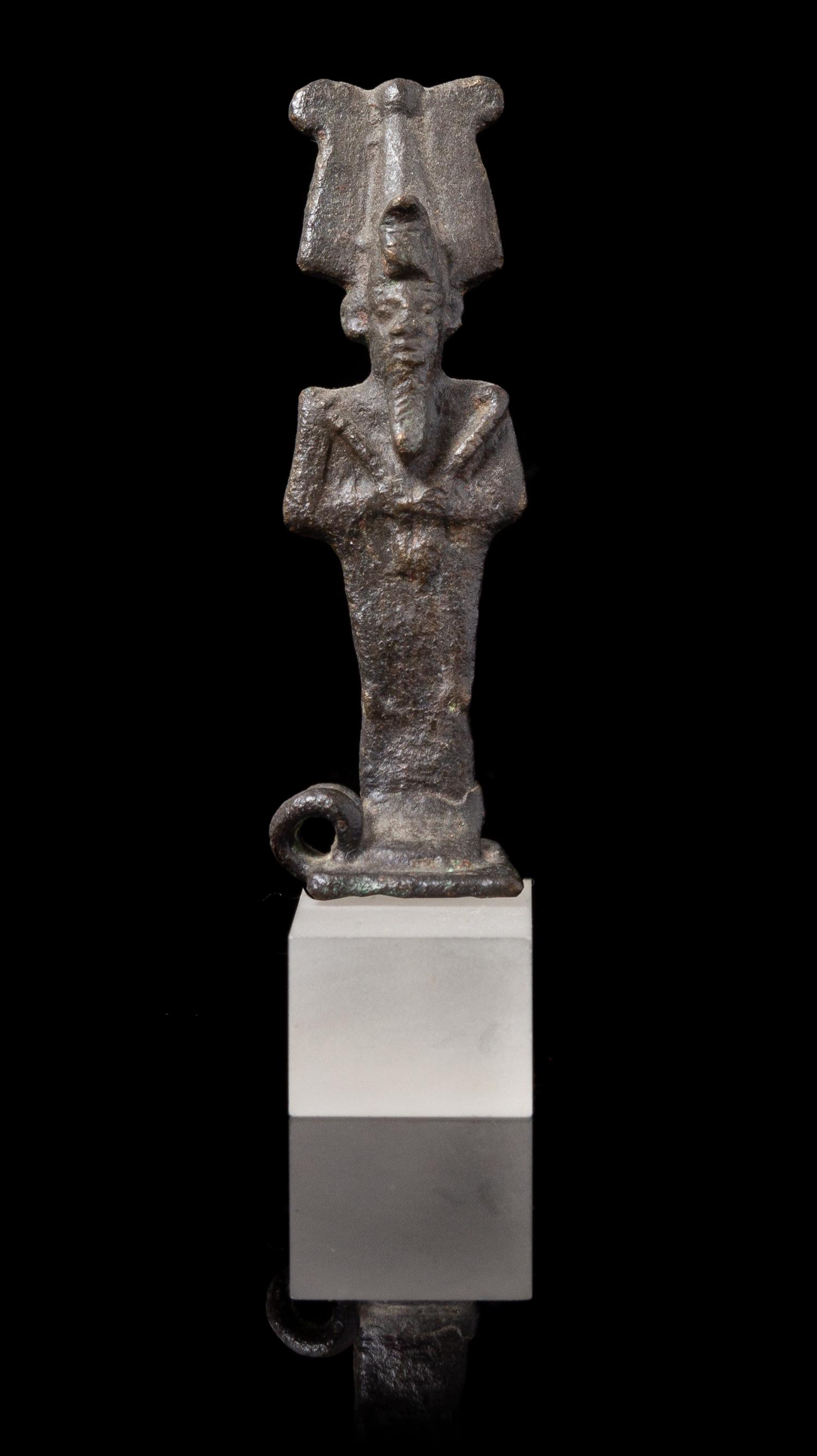 An Egyptian Bronze Amulet of Osiris Height 2 3/4 inches. — LATE PERIOD TO PTOLEMAIC PERIOD, 664-30 B.C.E.