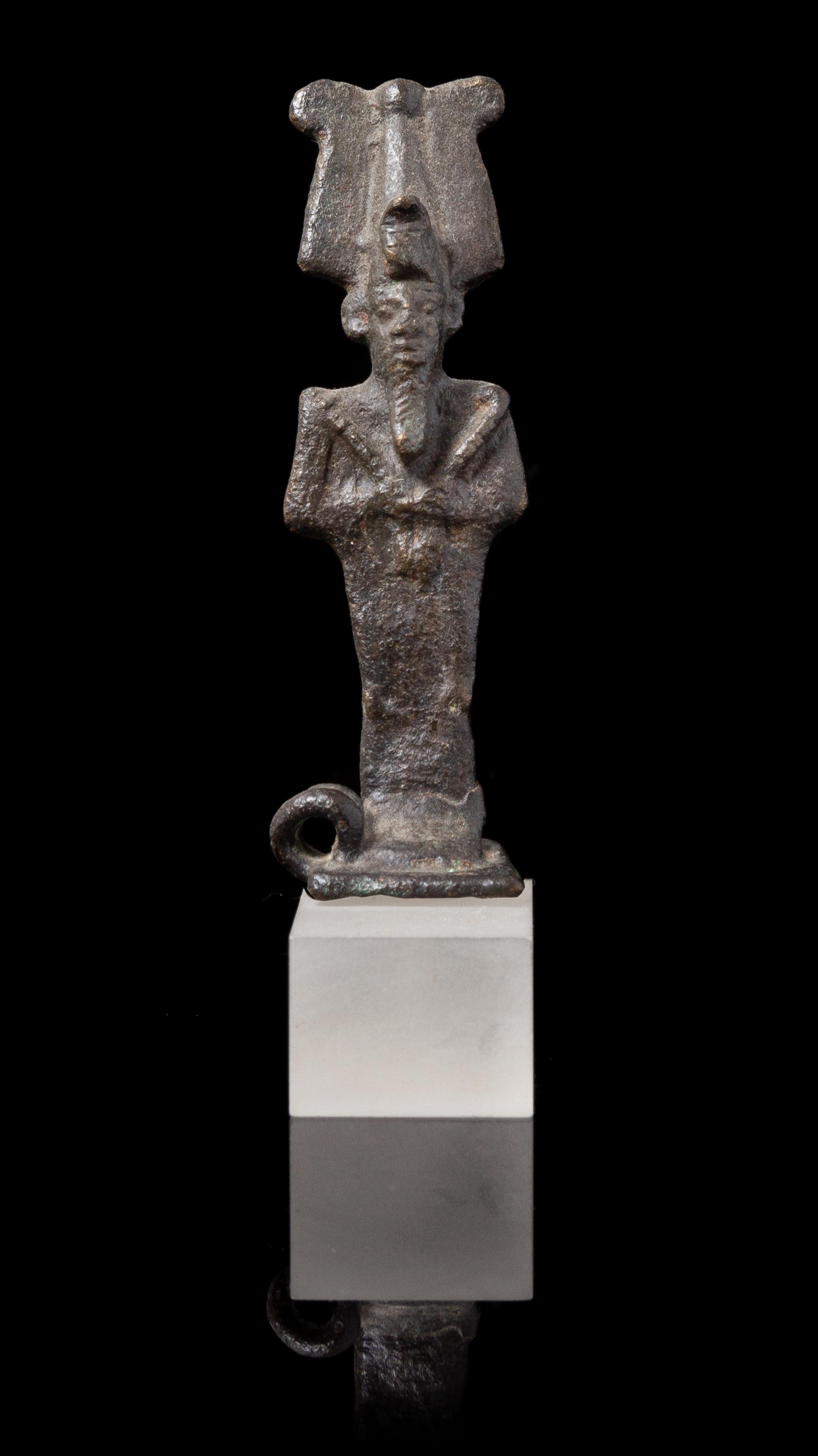 An Egyptian Bronze Amulet of Osiris Height 2 3/4 inches. — LATE PERIOD TO PTOLEMAIC PERIOD, 664-30 B.C.E.