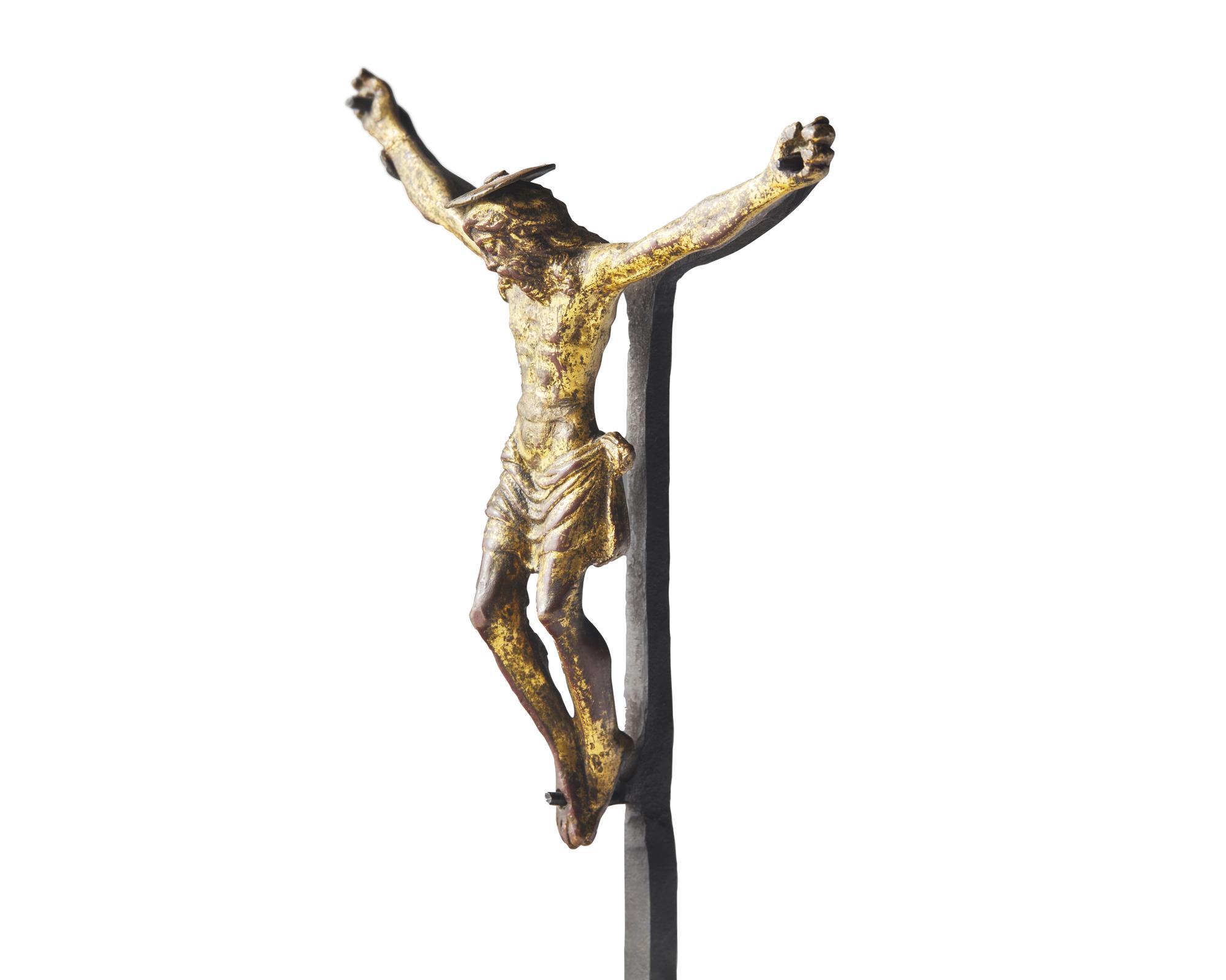 Circle of Severo da Ravenna (Italian, 1465-1543), An Italian gilt bronze crucifix, 16th century
