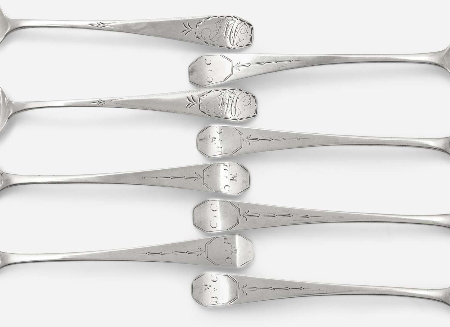 A group of eight Federal silver coffin-end tablespoons, Thomas Baker Burger (active 1805-1806), New York, NY, and maker "HG," circa 1805