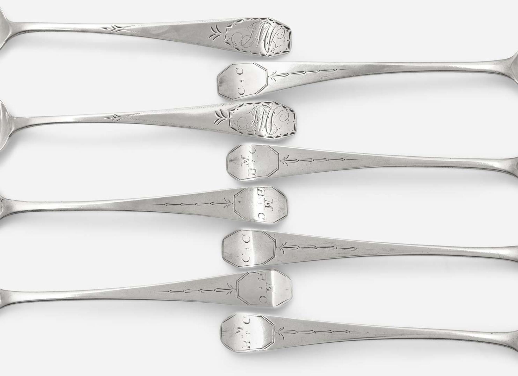 A group of eight Federal silver coffin-end tablespoons, Thomas Baker Burger (active 1805-1806), New York, NY, and maker "HG," circa 1805