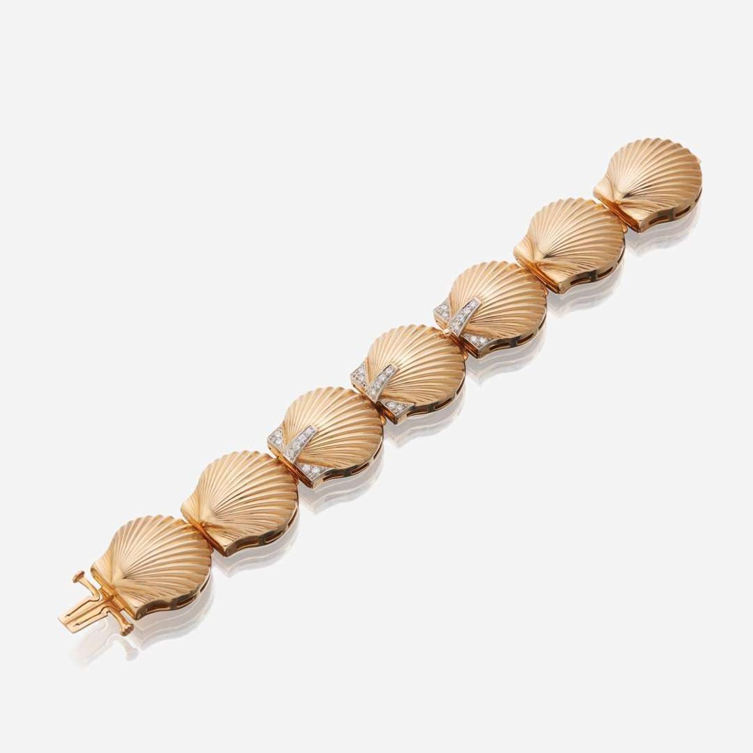A fourteen karat gold and diamond bracelet watch, J. Schulz