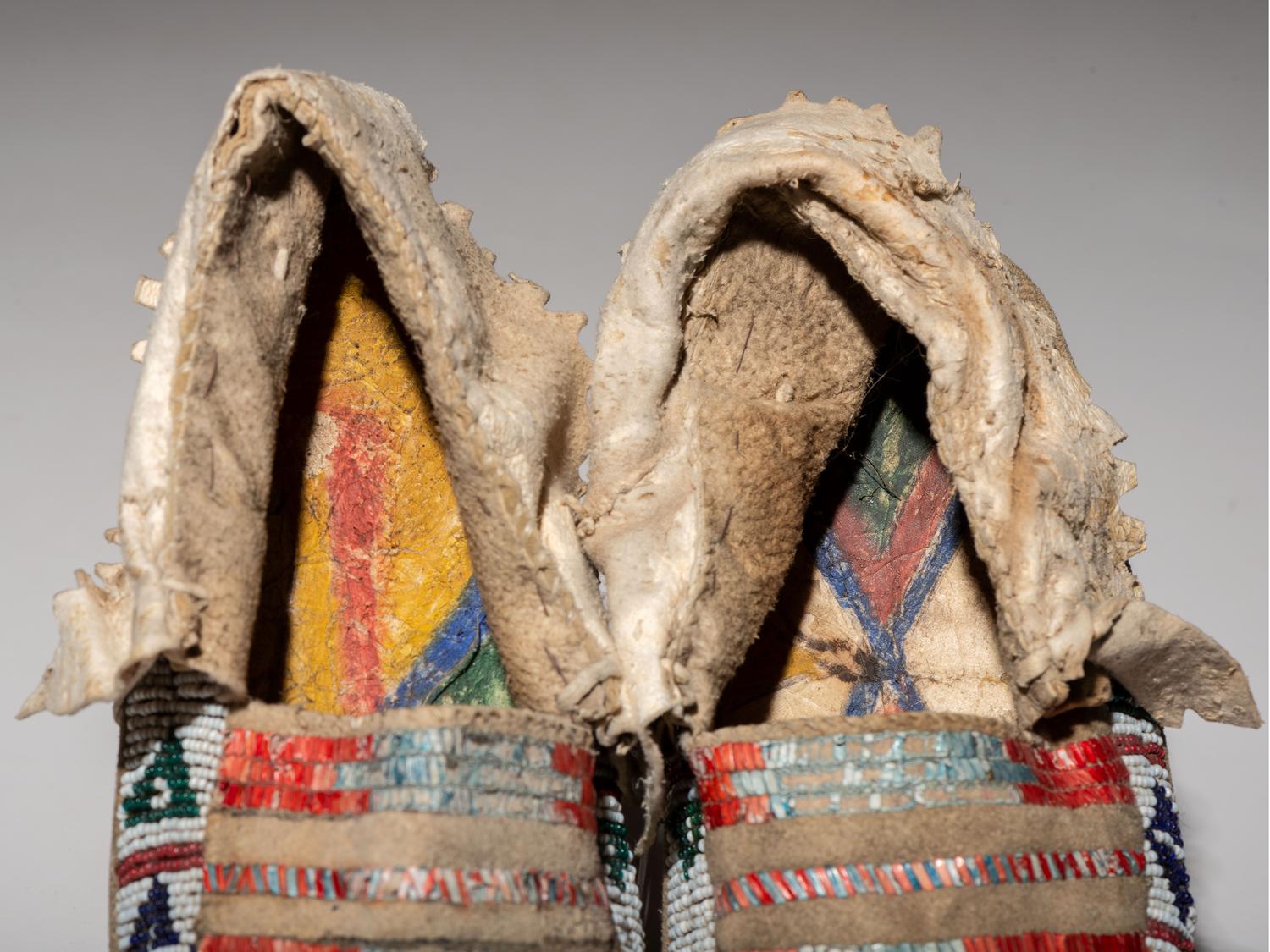 Northern Plains Beaded and Quilled Moccasins, with Painted Parfleche Soles