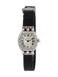 CARTIER PARIS, ART DECO, DIAMOND AND PLATINUM WATCH