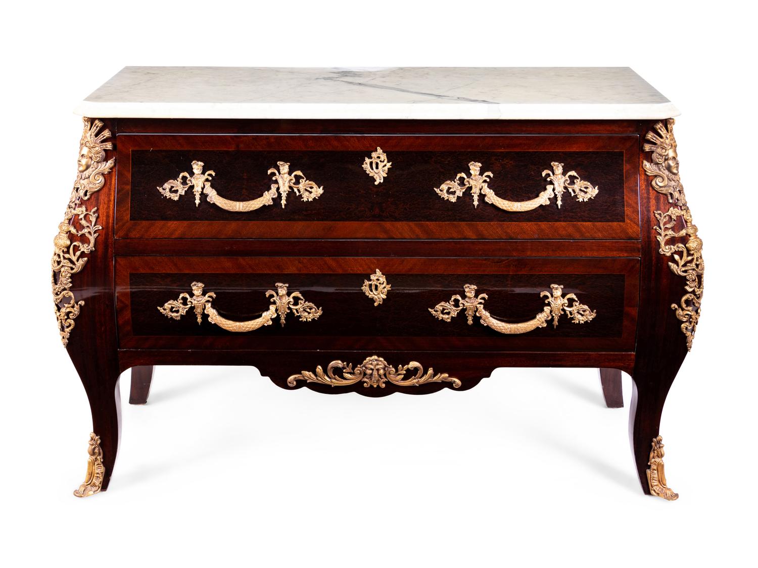 A Régence Style Gilt Metal Mounted Marble-Top Commode
