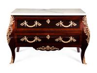 A Régence Style Gilt Metal Mounted Marble-Top Commode